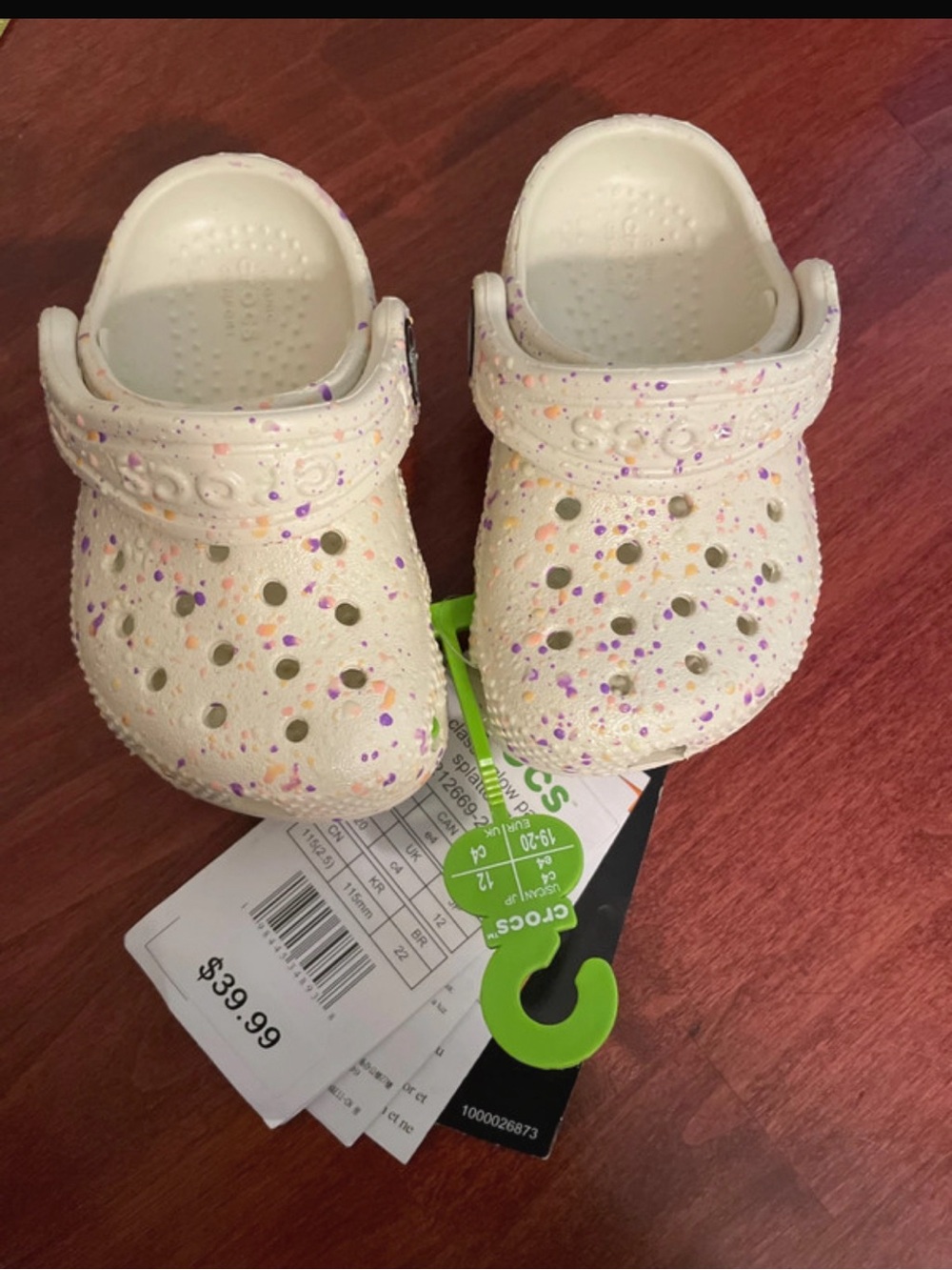 Glow In The DarkCROCS Kids' Cream Confetti Clogs with Purple & Orange Speckles